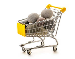 Canvas Print - Sea stones in small supermarket pushcart