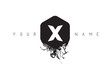 X Letter Logo Design with Black Ink Spill