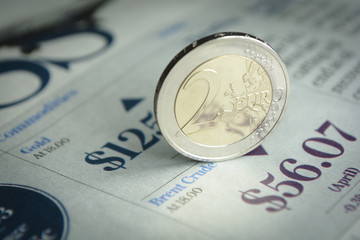 2 euro coin money (EUR), currency of European Union, Germany isolated over white business newspaper background