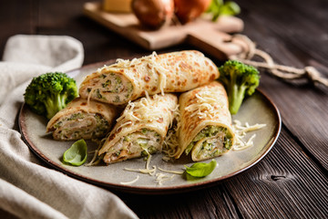 Wall Mural - Broccoli pancakes with sour cream, cheese and onion