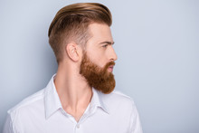 Side View Portrait Of Confident Bearded Man With Beautiful Hairstyle   In White Shirt Looking On Copy Space