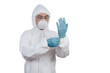 Leinwandbild Motiv Asian Chinese scientist in protective wear putting on gloves