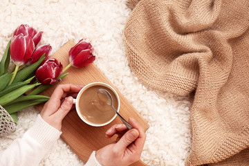 Wall Mural - a delicious mug of hot coffee in bed