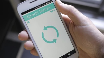 Credit score app on smartphone showing a good credit history result to the user.