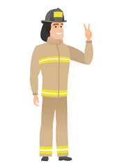 Poster - Caucasian firefighter showing the victory gesture.