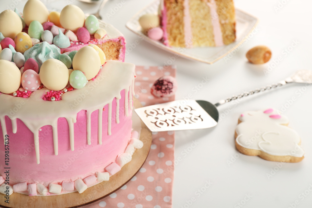 Sliced Easter cake on festive table