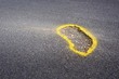 © anystock - Broken road surface with yellow paint alert