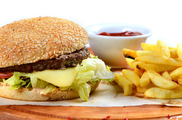 Wall Mural - Big burger and chips on the table