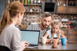 © LIGHTFIELD STUDIOS - Young family in kitchen