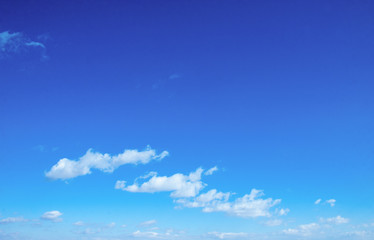 white clouds in the blue sky