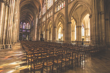 Church Nave With Light Streaming Through The Windows