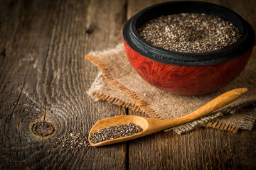 Healthy Chia seeds in a wooden spoon 