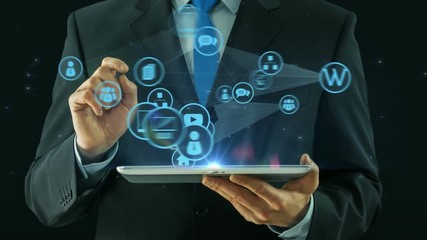 Business man pointing on web development concept tablet pad
