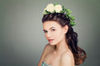 © artmim - Fashion Model with Prom Hairstyle and Spring Flowers Wreath on Banner Background. Young Woman