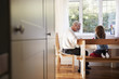 © Monkey Business - Grandfather And Granddaughter Colouring Picture Together