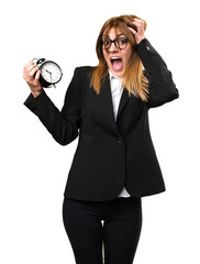 Sticker - Young business woman holding vintage clock