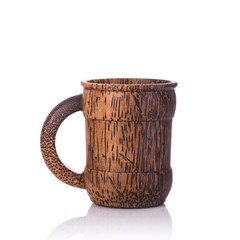 Wall Mural - Brown coffee cup made from palm wood. Studio shot isolated on white