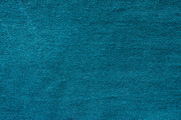 Turquoise fabric background. Cloth texture as blank backdrop