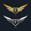 Wings Shield Letter E Logo Template 