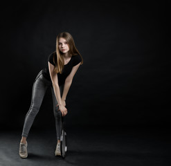 Portrait of sporty teen girl tennis player with racket