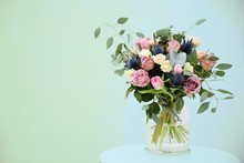 Glass Vase With Beautiful Bouquet On Light Background