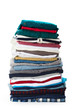© fotofabrika - Stack of clothes on white background, closeup