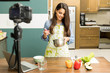 © AntonioDiaz - Food blogger whisking some eggs