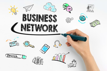 Wall Mural - business network concept. hand with marker writing.