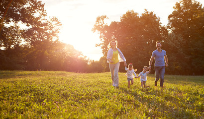 Family running in park