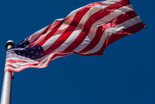 American Flag Unfurls In Interesting Pattern On Flagpole