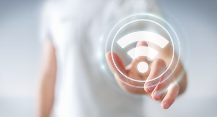 Poster - Businessman using free wifi hotspot interface 3D rendering