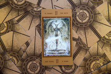 tarot card the devil. labirinth tarot deck. esoteric background.