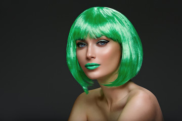 Wall Mural - Beautiful girl in green wig