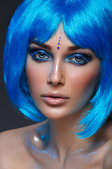 Wall Mural - Beautiful girl in blue wig