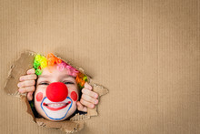 Funny Kid Clown Playing Indoor