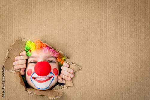 Fotografía Funny kid clown playing indoor