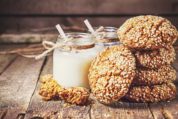 Wall Mural - Drinking yogurt in bottles and cookies, selective focus