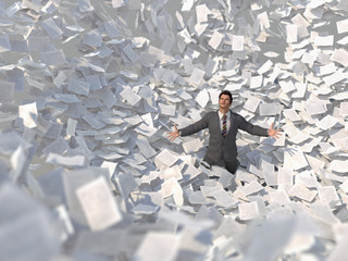 businessman in a paper storm