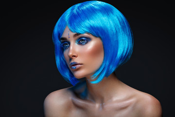 Wall Mural - Beautiful girl in blue wig