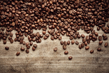 Wall Mural - Roasted coffee beans on linen fabric