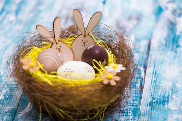 Happy Easter background, Bunny and Easter eggs in nest