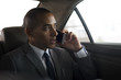 © Rawpixel.com - Businessman Use Mobile Talk Car