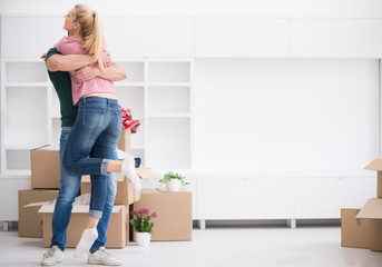 happy Young couple moving in new house