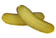 One pickled cucumber cut in half on white background