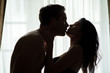 © DenisProduction.com - Couple near window. Woman and man in darkness. Your kiss is my remedy.