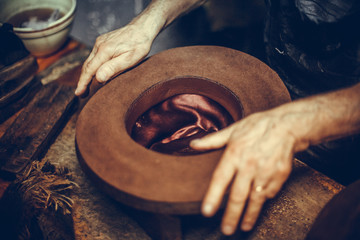 Hatter making a hat