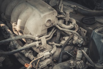 Dirty details of car engine. Macro shot.