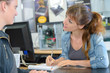 © auremar - Shop keeper taking notes from customer