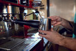 © Studio Romantic - The hands of  barista bartenders make an espresso of coffee on  machine in cafe bar. Closeup.