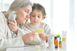© aletia2011 - Granddaughter takes care of a sick grandmother